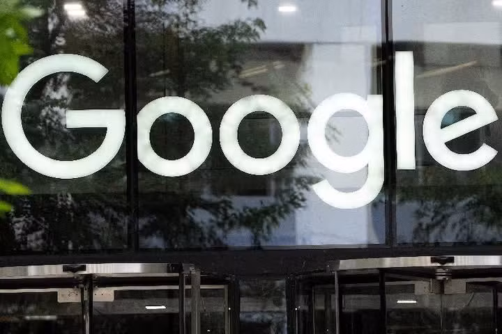 The Google logo is seen outside the company's offices in London, Britain, June 24, 2025. REUTERS/Carlos Jasso/File Photo Purchase