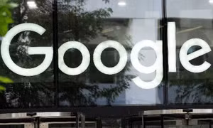 The Google logo is seen outside the company's offices in London, Britain, June 24, 2025. REUTERS/Carlos Jasso/File Photo Purchase