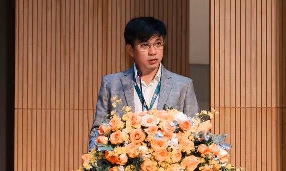 PGS.TS Bùi Quang Hùng - Giám đốc Đại học Kinh tế TP.HCM - phát biểu khai mạc hội thảo - Ảnh: K.P.